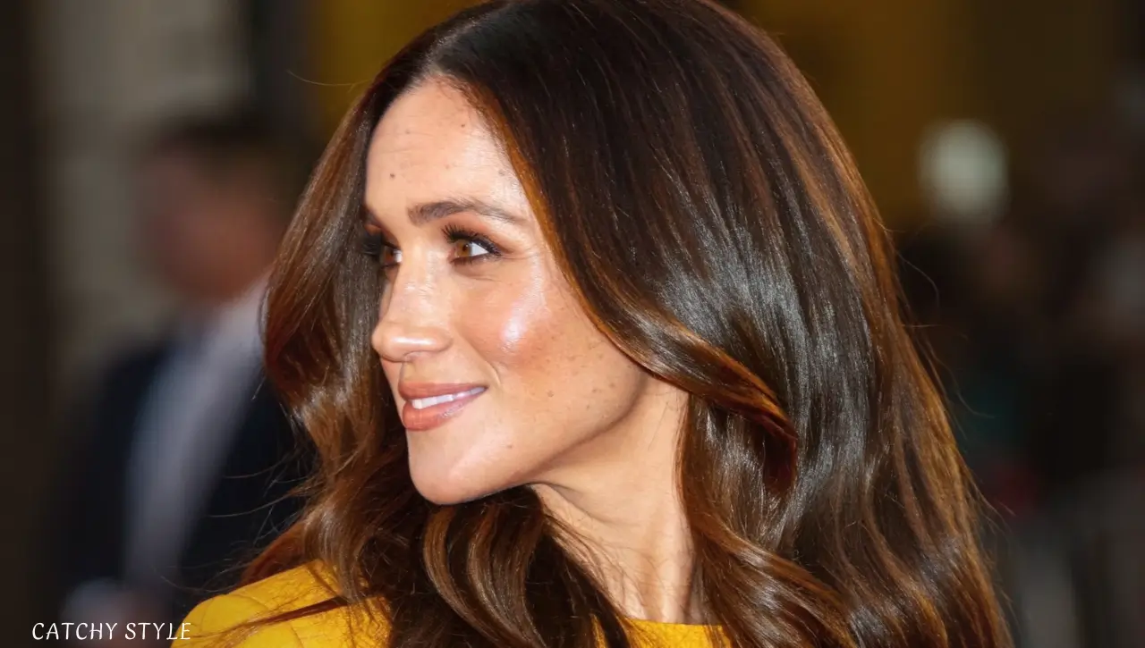 Elegant hairstyle in rich Deep Golden Brunette hair color for a warm, radiant, and sophisticated appearance Woman with glossy Deep Golden Brunette hair color